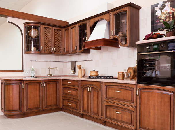 近代的な設備と豪華な新しい茶色のキッチン - 写真・画像