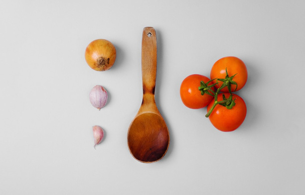 Raw pasta and fresh tomatos ingredients overhead - Photo, image