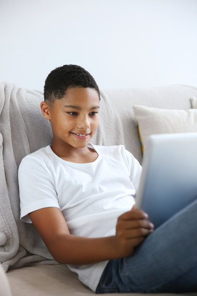 African American boy with tablet  - Fotó, kép
