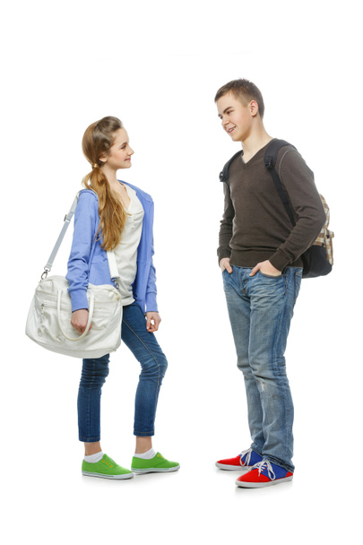 Teenage boy and girl isolated on white - Foto, afbeelding