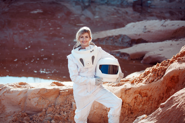 futuristic astronaut without a helmet on another planet, image with the effect of toning - Photo, Image