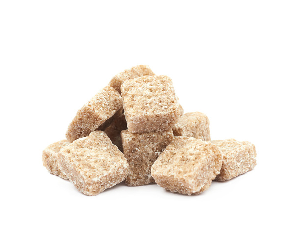 Pile of brown sugar cubes isolated - Фото, зображення