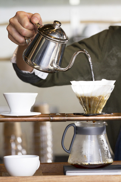 Hand pouring hot water for dripping Coffee  - Fotoğraf, Görsel
