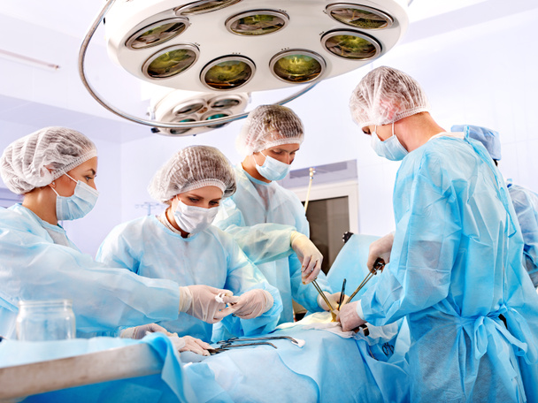 Surgeon at work in operating room. - Photo, Image