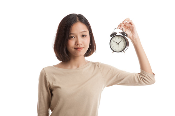 Young Asian business woman with a clock - Valokuva, kuva