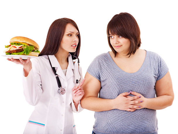 Femme avec hamburger et médecin
. - Photo, image