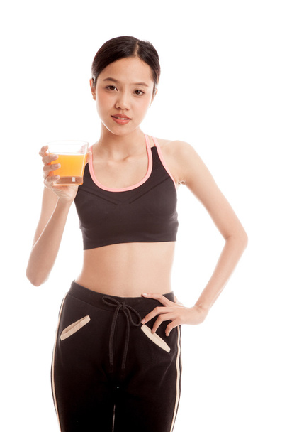 Beautiful Asian healthy girl drinking  orange juice - Foto, Imagen