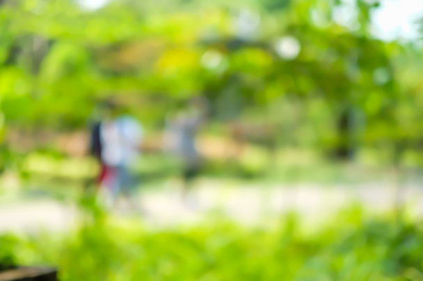 Blurred background ,People exercise in park ,pale vintage filter - Фото, изображение