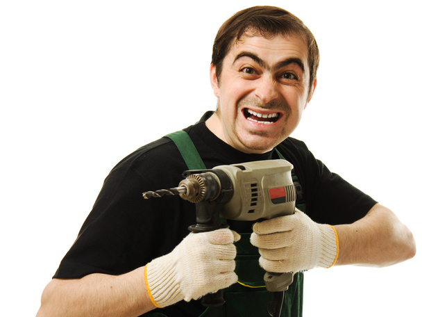 Male worker with an electric dril - Zdjęcie, obraz