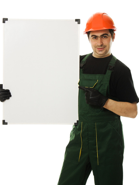Senior constructor holding the blank board - Foto, imagen