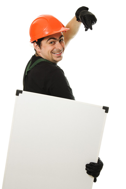 Senior constructor holding the blank board - Foto, afbeelding