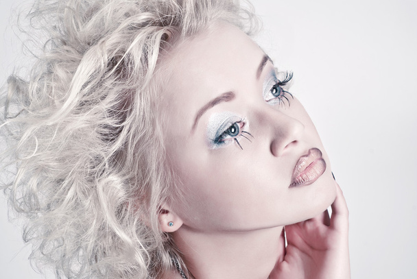 Attractive blond beauty portrait with original make up - Фото, зображення