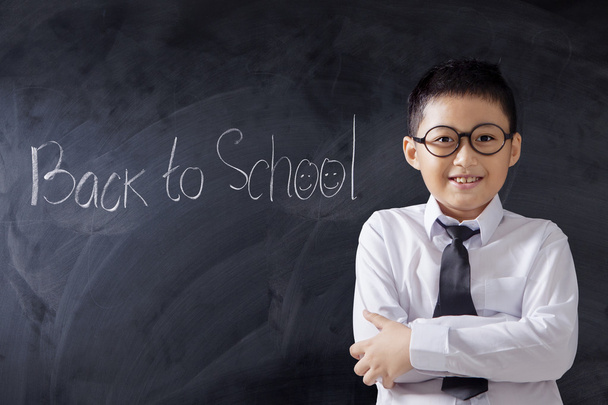 Confident boy with text of Back to School - Фото, зображення