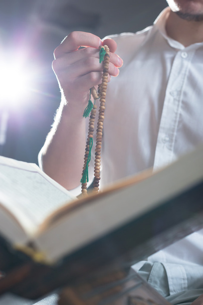 Hand holding a muslim rosary - Zdjęcie, obraz