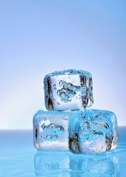Three ice cubes on glass  - Foto, Imagen
