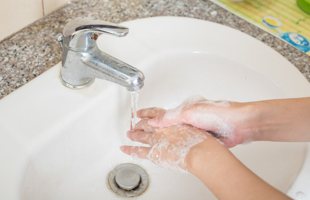 Washing on hands. Cleaning hands with soap. - Photo, Image