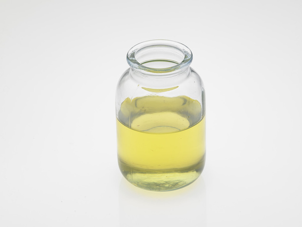 Vegetable oil in bottle - Foto, afbeelding