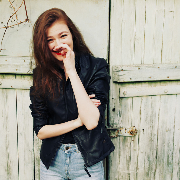 Lifestyle fashion portrait of sexy beautiful model with red lipstick  - Fotó, kép