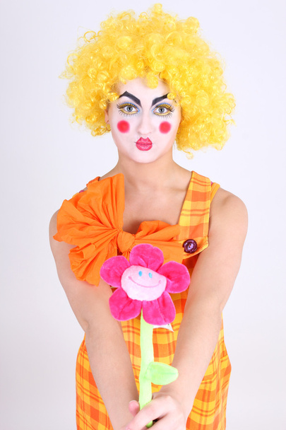 Funny clown with colourful flower - Fotoğraf, Görsel