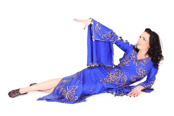 Woman in blue dress lying - Фото, зображення