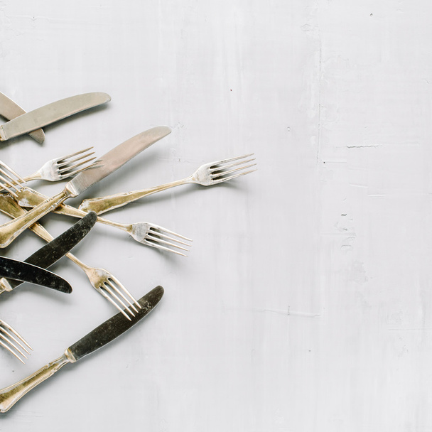 tenedores y cuchillos de oro
 - Foto, imagen