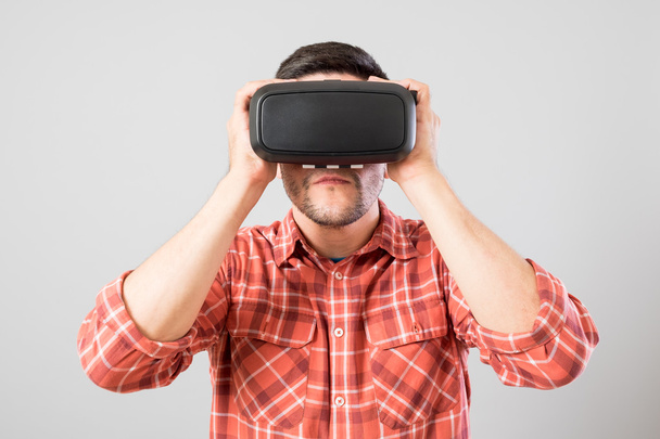 Man using virtual reality headset - Фото, зображення