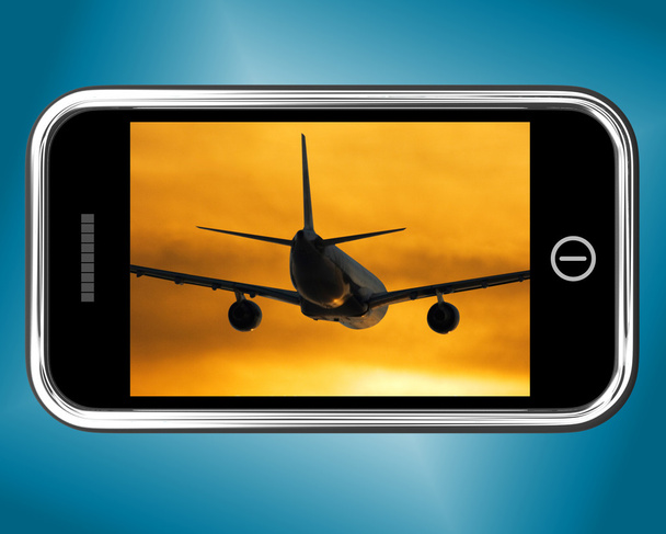 Airplane Flying Towards The Sunset On Mobile Phone - Photo, Image