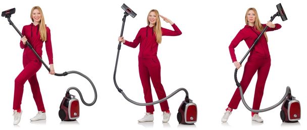 Young woman with vacuum cleaner on white - Фото, изображение