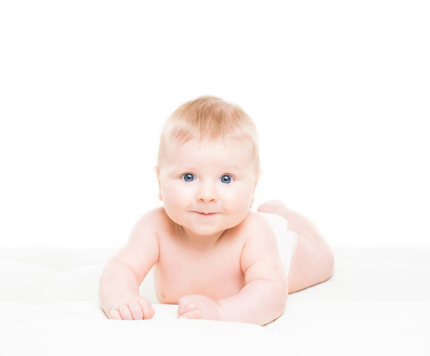 Portrait of a cute smiling infant baby crawling - Zdjęcie, obraz