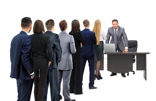 Business people looking at boss standing back side - Photo, Image