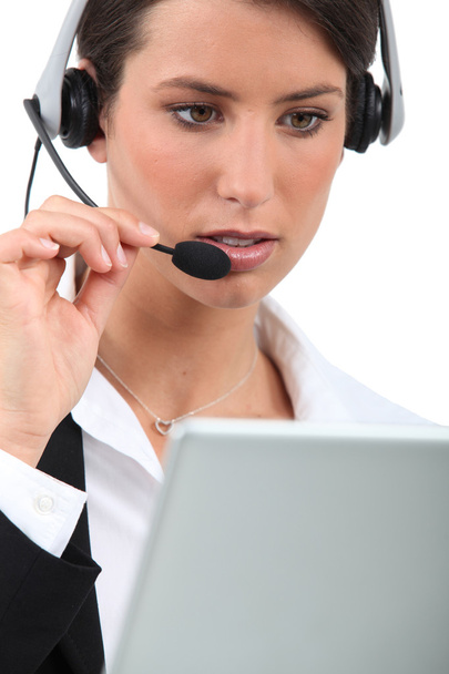 Close-up of a woman with headset - Photo, Image
