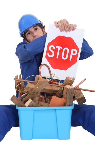 Builder suggesting stop wasting materials - Fotografie, Obrázek