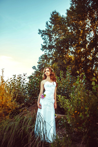 girl in white dress in forest - Valokuva, kuva