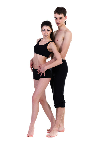 couple man and woman exercising fitness dancing on white background - Photo, Image