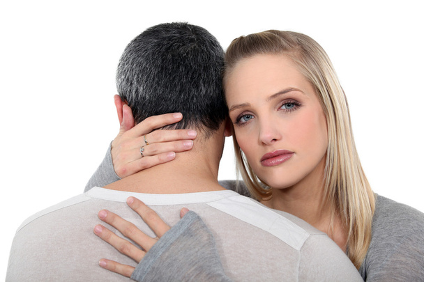 Couple in a serious embrace - Photo, Image