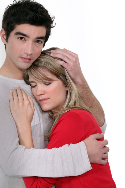 A man comforting his girlfriend. - Foto, Bild