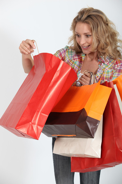 Woman delighted with purchases - Foto, imagen