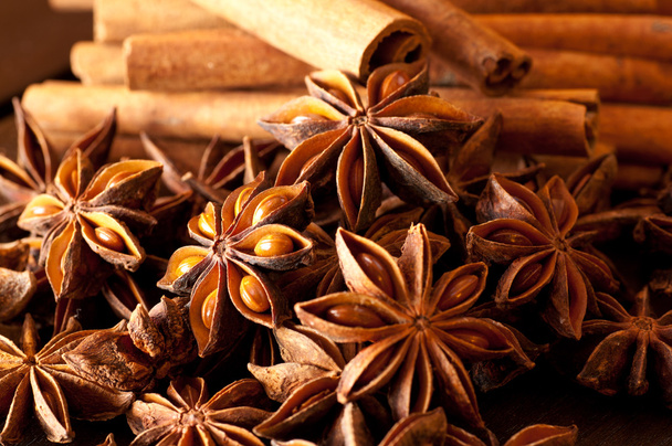 Extreme close up of star anise and cinnamon sticks - Photo, Image