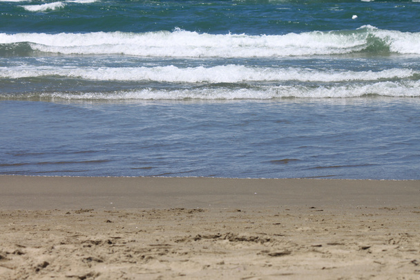 Natur schöner Sandstrand Hintergrund an einem Sommertag - Foto, Bild