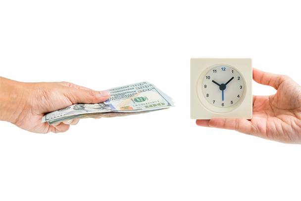 Χέρι κρατήστε Δολάριο συνάλλαγμα μετρητά με χέρι κρατήστε ρολόι του χρόνου - Φωτογραφία, εικόνα