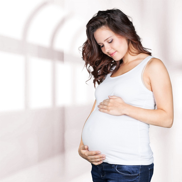 Pregnant young woman  - Фото, изображение