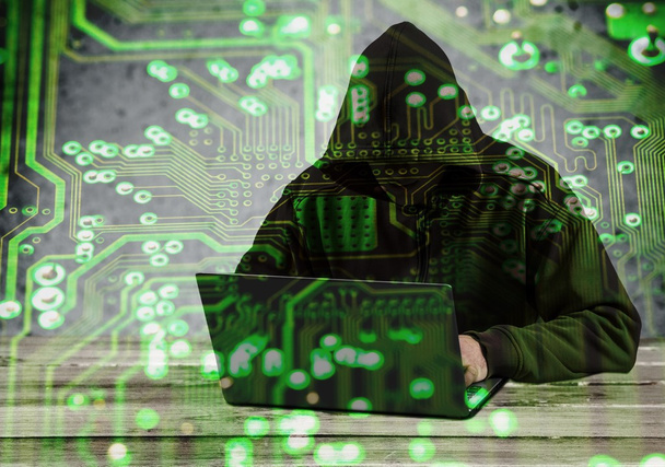 Hacker using laptop.  - Foto, imagen