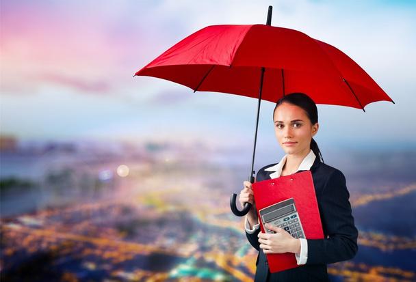 Beautiful businesswoman portrait with umbrella - Fotó, kép