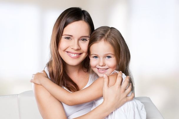 Mother and daughter hugging   - Photo, image