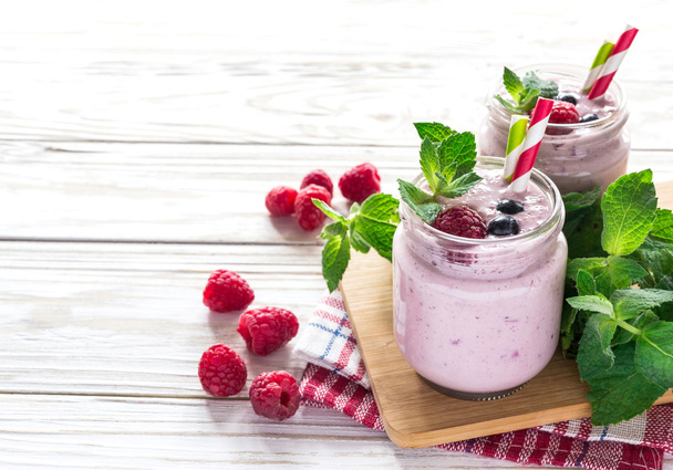Raspberries fruit smoothie or milk shake - 写真・画像