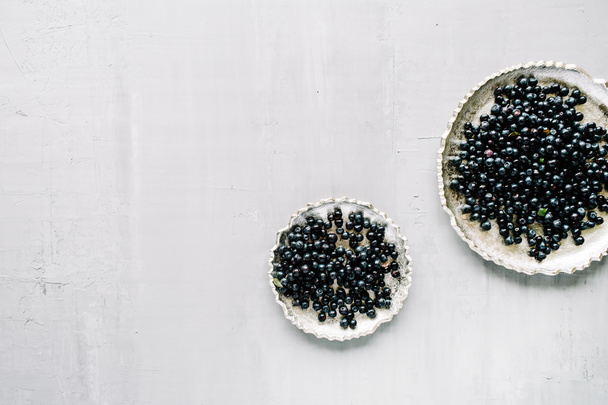 bilberry at golden retro tray  - Фото, зображення