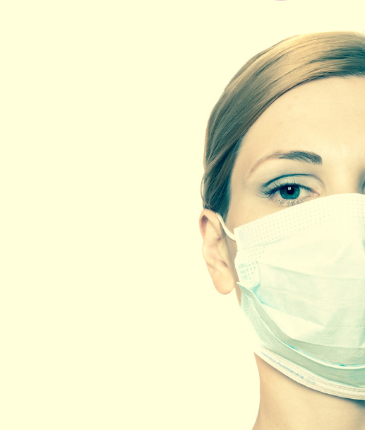 Médico feminino usando máscara
 - Foto, Imagem