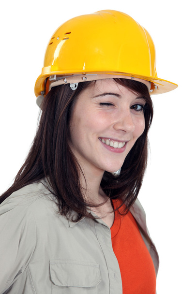 Wink from a female construction worker - Zdjęcie, obraz