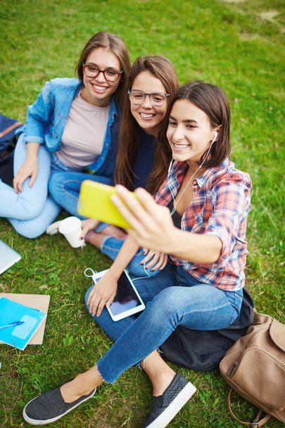 Girls making selfie on mobile phone  - Valokuva, kuva