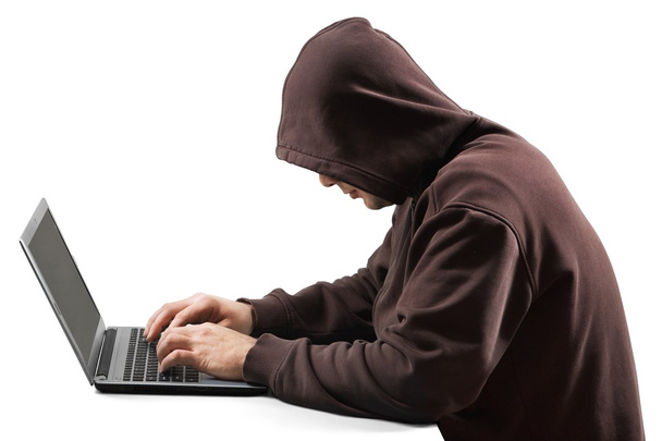 Hacker muž pomocí přenosného počítače.  - Fotografie, Obrázek